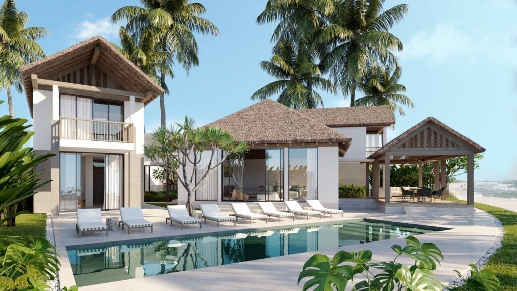 A large pool with white chairs and palm trees.