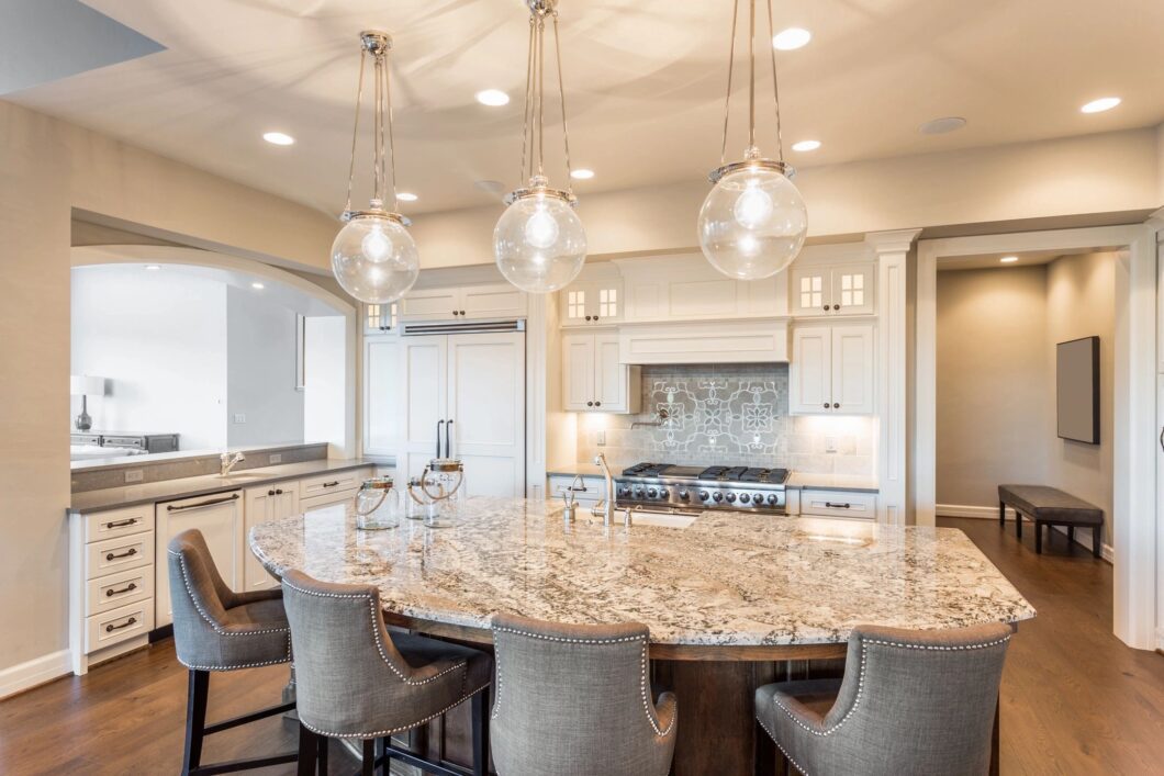 A large kitchen with a big table and chairs