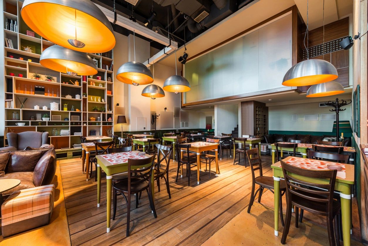 A restaurant with tables and chairs in it