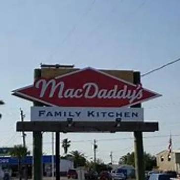 A sign for mac daddy 's family kitchen