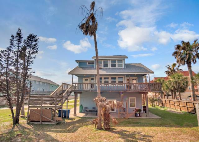 A house with a tree in the yard